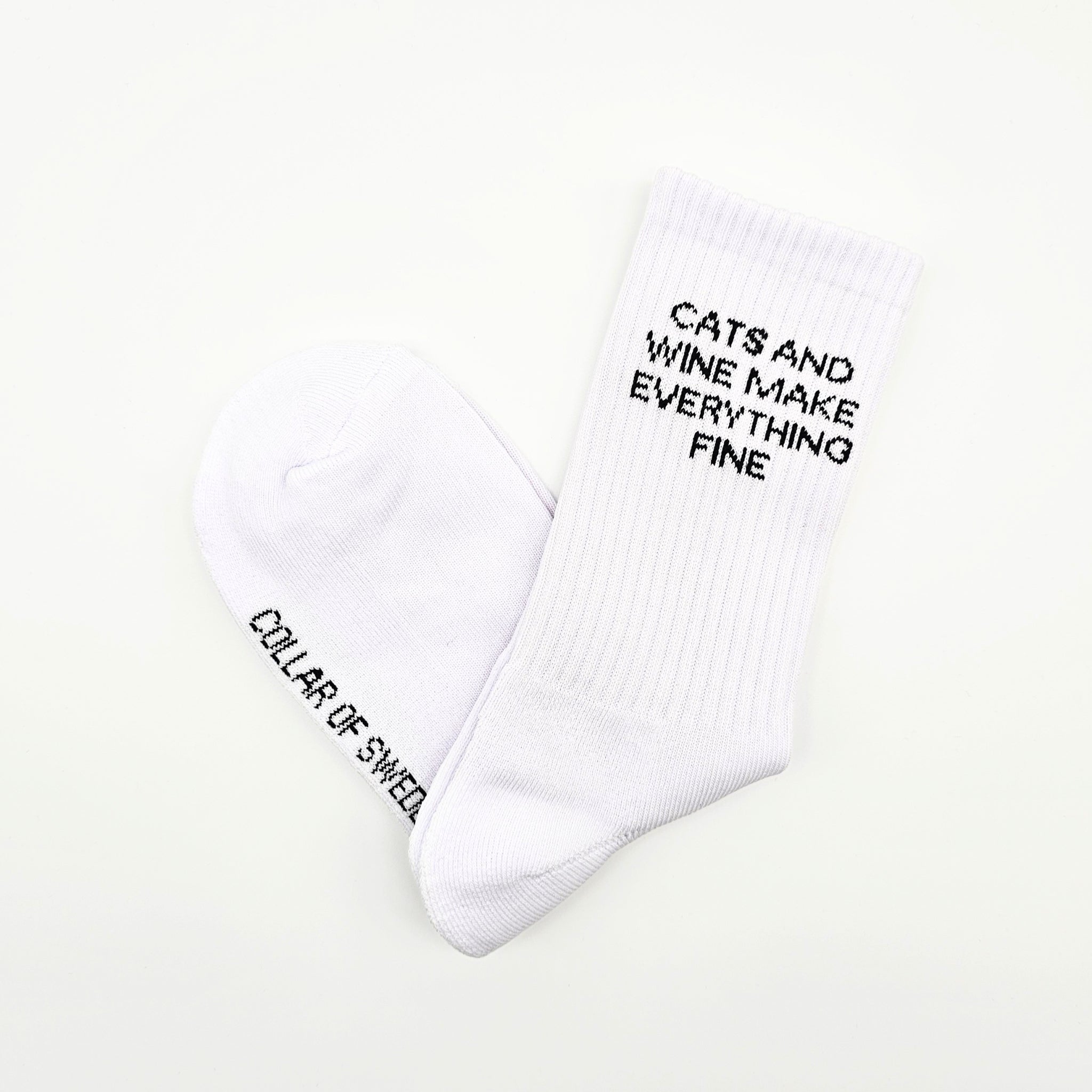 white-tube-socks-cats-and-wine-small-text-folded.jpg